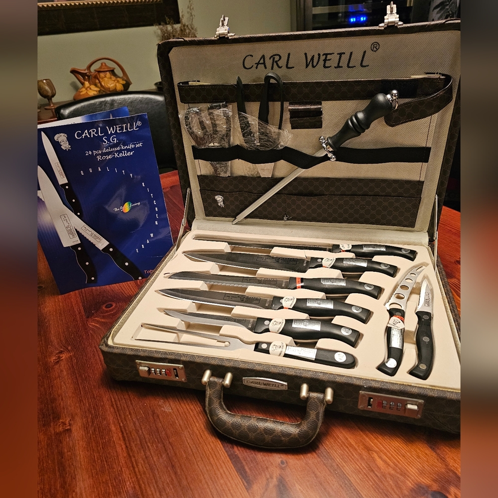 Carl Weill 24pc knife set in carrying case. Never used.‎